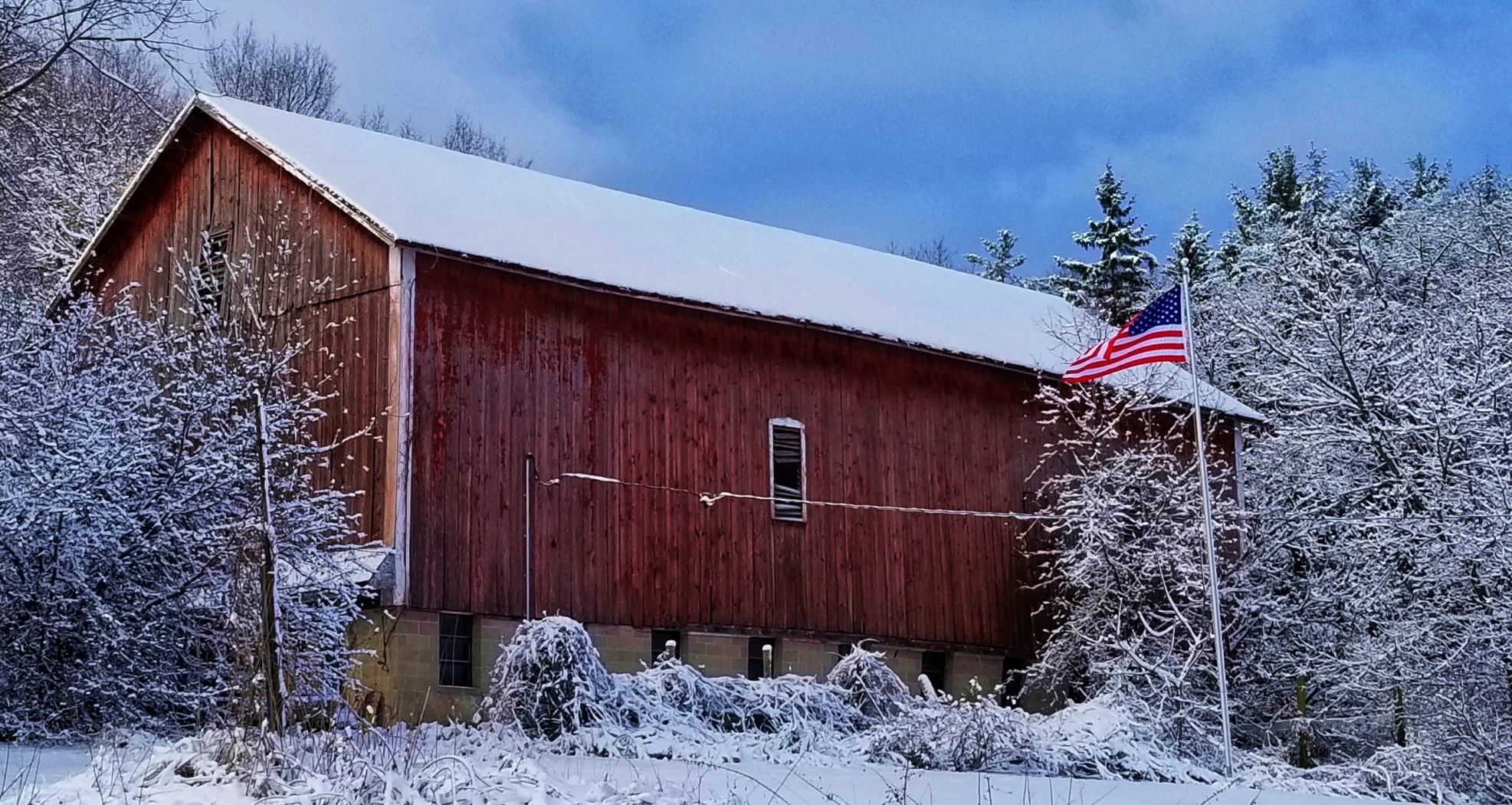 Barn hibernates on hillside